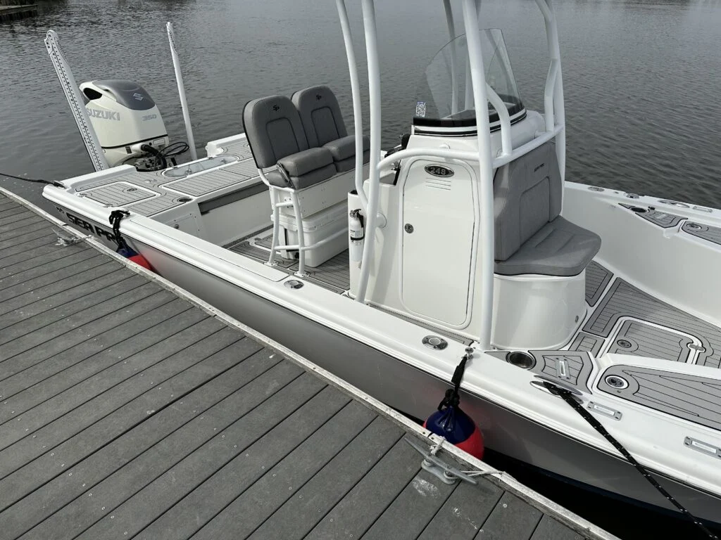 Red Phender Pros fender between a Sea Pro boat and the dock