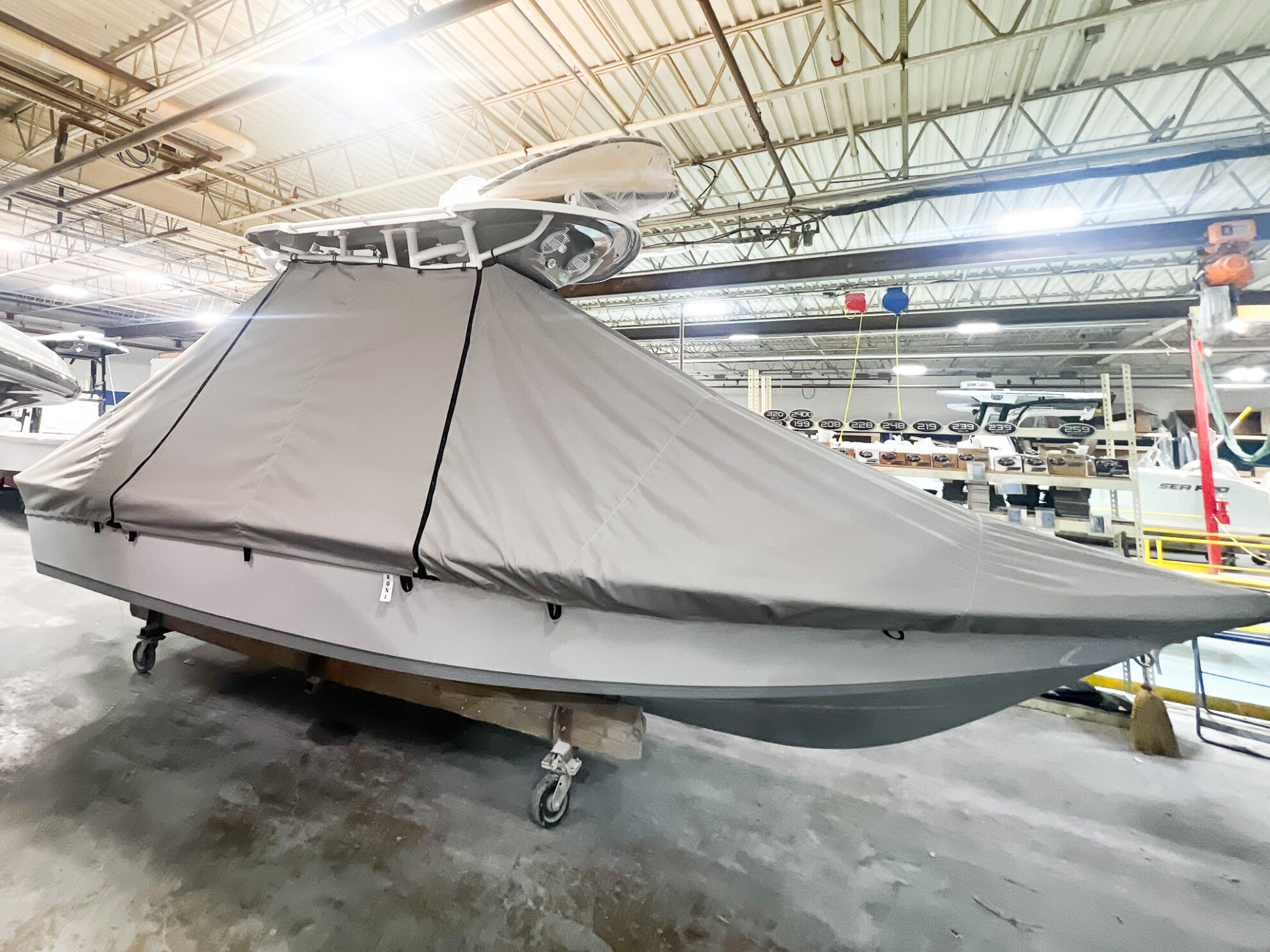 Sea Pro under a fitted mooring cover
